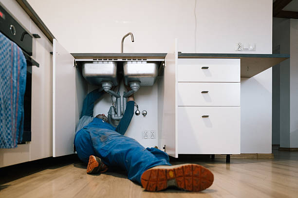 Professional Drain Cleaning technician working in Athens, WV